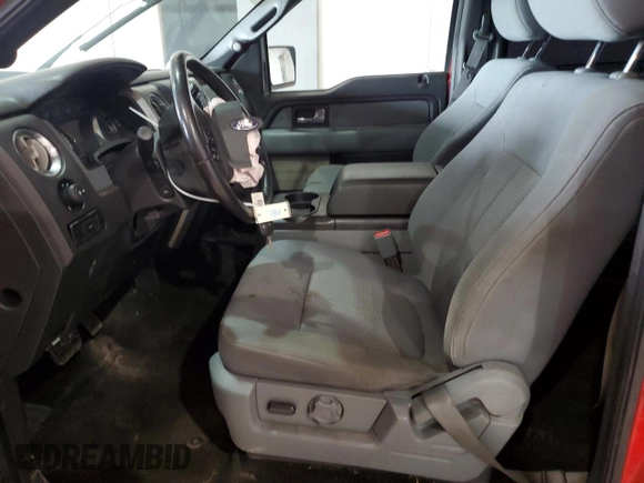 2014 Ford F-150 XL with VIN 1FTFW1EF8EFB59235, listed as a Copart auction lot 54677625 with 179,931 mi miles and Salvage title. Bid and sale history available at DreamBid. Image 7.