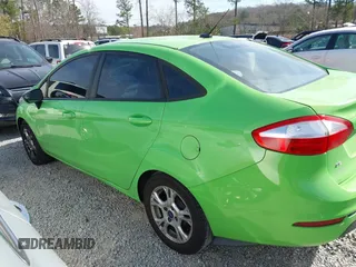 2014 Ford Fiesta SE with VIN 3FADP4BJ8EM226260, listed as a IAAI auction lot 41833140 with 188,917 mi miles and . Bid and sale history available at DreamBid. Image 14.