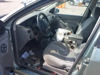 2003 Ford Focus SE Fleet с VIN 1FAFP36363W142000, выставлен на аукционе IAAI как лот 39992234 с пробегом 317 957 миль миль и . История ставок и продаж доступна на DreamBid. Изображение 5.