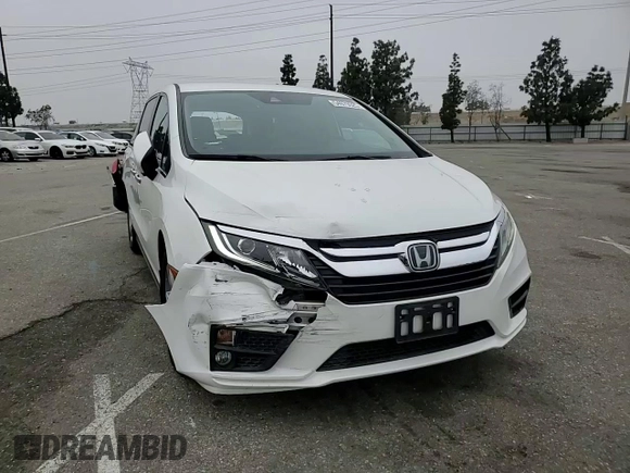 2020 Honda Odyssey EX with VIN 5FNRL6H57LB038073, listed as a Copart auction lot 54979525 with 38,114 mi miles and Salvage title. Bid and sale history available at DreamBid. Image 14.