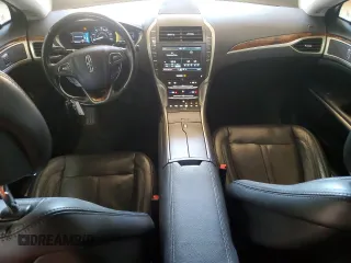 2015 Lincoln MKZ Hybrid z VIN 3LN6L2LU1FR606066, wystawiony jako Copart lot #61955415 z przebiegiem 127 214 mil mil oraz Szkoda całkowita • Salvage title. Historia ofert i sprzedaży dostępna na DreamBid. Obrazek 8.