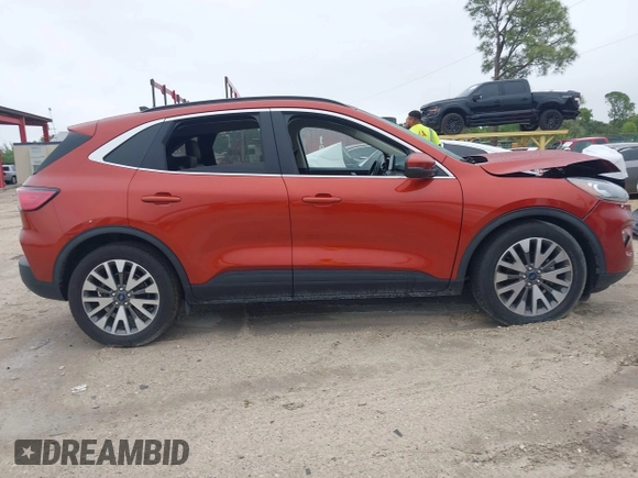 2020 Ford Escape Titanium Hybrid with VIN 1FMCU0DZ1LUB13684, listed as a IAAI auction lot 41629782 with 31,669 mi miles and . Bid and sale history available at DreamBid. Image 13.