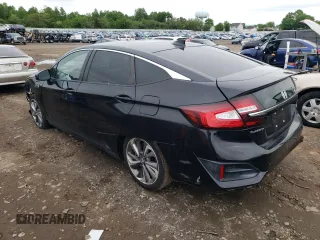 2018 Honda Clarity Plug-In Hybrid with VIN JHMZC5F18JC014058, listed as a Copart auction lot 55027004 with 68,476 mi miles. Bid and sale history available at carsss.com. Image 2.