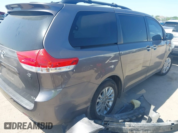 2014 Toyota Sienna XLE with VIN 5TDYK3DC4ES419928, listed as a IAAI auction lot 41976538 with 144,405 mi miles. Bid and sale history available at carsss.com. Image 3.