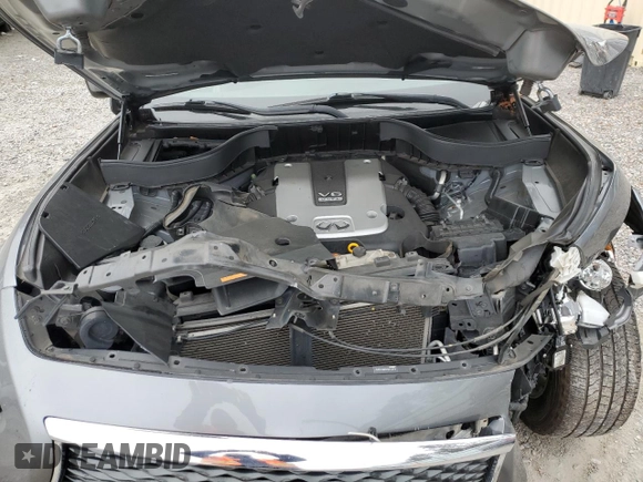 2017 Infiniti QX70 z VIN JN8CS1MW6HM415974, wystawiony jako Copart lot #86130374 z przebiegiem 77 638 mil mil oraz Szkoda całkowita • Salvage title. Historia ofert i sprzedaży dostępna na DreamBid. Obrazek 14.