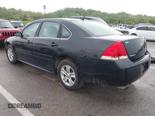 2013 Chevrolet Impala LS with VIN 2G1WF5E32D1149568, listed as a IAAI auction lot 42131854 with 194,934 mi miles and . Bid and sale history available at DreamBid. Image 3.