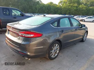 2017 Ford Fusion SE with VIN 3FA6P0H78HR379256, listed as a IAAI auction lot 42463766 with 129,066 mi miles and . Bid and sale history available at DreamBid. Image 4.