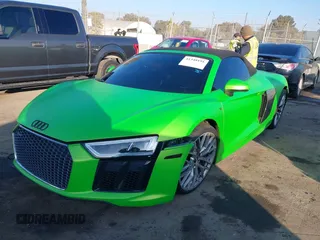 2017 Audi R8 z VIN WUAVACFX5H7903923, wystawiony jako IAAI lot #41348191 z przebiegiem 53 883 mil mil oraz . Historia ofert i sprzedaży dostępna na DreamBid. Obrazek 2.