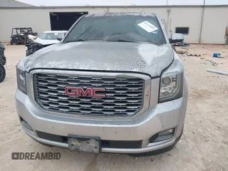 2019 GMC Yukon XL Denali with VIN 1GKS1HKJ0KR257673, listed as a IAAI auction lot 41375951 with 71,291 mi miles. Bid and sale history available at carsss.com. Image 6.