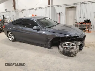 2015 BMW 4 Series 428i xDrive with VIN WBA3N9C55FK247390, listed as a Copart auction lot 54509275 with 64,858 mi miles and Salvage title. Bid and sale history available at DreamBid. Image 4.