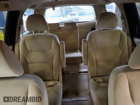 2009 Honda Odyssey LX with VIN 5FNRL38259B018546, listed as a Copart auction lot 62142015 with 162,459 mi miles and Salvage title. Bid and sale history available at DreamBid. Image 10.