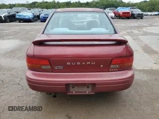 1996 Subaru Impreza with VIN JF1GC4557TH512593, listed as a Copart auction lot 74099464 with 112,437 mi miles and Salvage title. Bid and sale history available at DreamBid. Image 6.