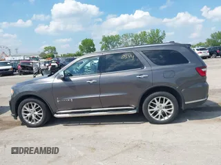 2014 Dodge Durango Citadel with VIN 1C4RDJEG0EC978611, listed as a IAAI auction lot 42250344 with 200,412 mi miles and . Bid and sale history available at DreamBid. Image 15.
