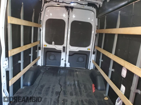 2021 Ford Transit Cargo with VIN 1FTBR1X81MKA08425, listed as a Copart auction lot 46747235 with 84,318 mi miles and Salvage Title. Bid and sale history available at DreamBid. Image 6.