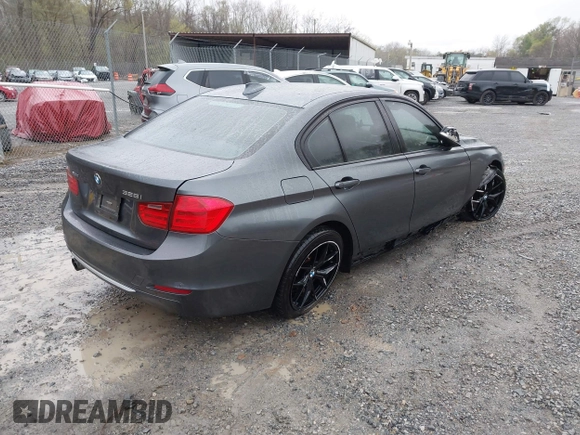 2013 BMW 3 Series 328i xDrive with VIN WBA3B3C56DF542509, listed as a IAAI auction lot 42010587 with 187,082 mi miles. Bid and sale history available at carsss.com. Image 4.