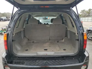 2006 GMC Envoy SLT with VIN 1GKDS13S762258032, listed as a Copart auction lot 88677095 with 184,188 mi miles and Salvage Title. Bid and sale history available at carsss.com. Image 6.