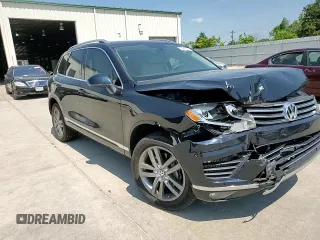 2015 Volkswagen Touareg Lux z VIN WVGEP9BP2FD006802, wystawiony jako Copart lot #52291965 z przebiegiem 122 787 mil mil oraz Szkoda całkowita • Salvage title. Historia ofert i sprzedaży dostępna na DreamBid. Obrazek 10.
