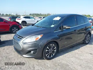 2017 Ford C-Max Energi Titanium with VIN 1FADP5FU9HL117693, listed as a IAAI auction lot 42059763 with 86,827 mi miles. Bid and sale history available at carsss.com. Image 18.
