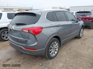 2020 Buick Envision Essence with VIN LRBFXCSAXLD212977, listed as a IAAI auction lot 41491154 with 64,148 mi miles. Bid and sale history available at carsss.com. Image 4.