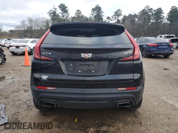 2023 Cadillac XT4 FWD Luxury with VIN 1GYAZAR45PF218684, listed as a Copart auction lot 46483515 with 74,920 mi miles and Salvage title. Bid and sale history available at DreamBid. Image 6.