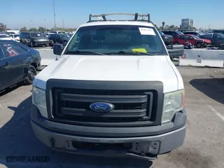 2014 Ford F-150 XL with VIN 1FTNF1CF5EKF62031, listed as a IAAI auction lot 41657632 with 216,689 mi miles. Bid and sale history available at carsss.com. Image 12.