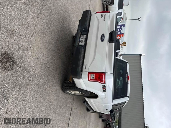 2015 Ford F-150 XLT with VIN 1FTFX1EF6FKE51858, listed as a IAAI auction lot 42260212 with 114,025 mi miles and . Bid and sale history available at DreamBid. Image 1.