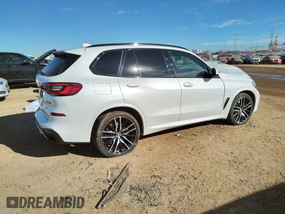 2020 BMW X5 M50i with VIN 5UXJU4C00L9B77869, listed as a Copart auction lot 36123043 with 27,195 mi miles. Bid and sale history available at carsss.com. Image 3.