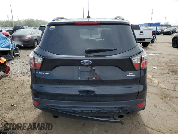 2017 Ford Escape SE with VIN 1FMCU0G98HUE89060, listed as a Copart auction lot 55286815 with 74,957 mi miles and Clean Title. Bid and sale history available at carsss.com. Image 6.