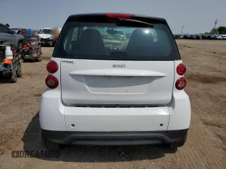 2014 Smart fortwo Pure z VIN WMEEJ3BA5EK779399, wystawiony jako Copart lot #59279785 z przebiegiem 117 204 mil mil oraz Tytuł czysty. Historia ofert i sprzedaży dostępna na DreamBid. Obrazek 6.
