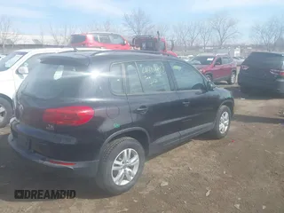2017 Volkswagen Tiguan S with VIN WVGBV7AX9HK018085, listed as a IAAI auction lot 41804052 with 71,943 mi miles and . Bid and sale history available at DreamBid. Image 4.