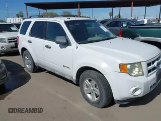 2009 Ford Escape Hybrid with VIN 1FMCU59369KC02897, listed as a IAAI auction lot 41841414 with 246,324 mi miles and . Bid and sale history available at DreamBid. Image 1.