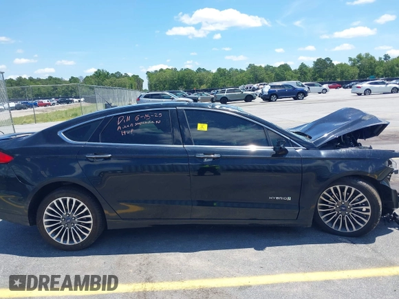 2018 Ford Fusion Titanium with VIN 3FA6P0RU8JR101306, listed as a IAAI auction lot 42542847 with 193,874 mi miles and . Bid and sale history available at DreamBid. Image 13.