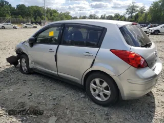 2011 Nissan Versa 1.8 S with VIN 3N1BC1CP2BL429874, listed as a Copart auction lot 70429314 with 136,531 mi miles and Salvage Title. Bid and sale history available at carsss.com. Image 2.