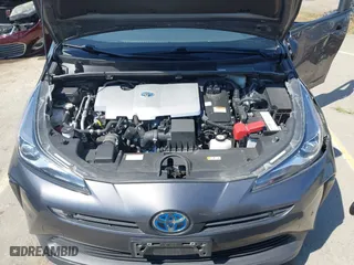 2022 Toyota Prius L Eco with VIN JTDKAMFU5N3160694, listed as a IAAI auction lot 41874909 with 80,376 mi miles. Bid and sale history available at carsss.com. Image 10.