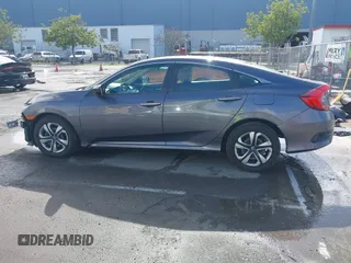 2017 Honda Civic LX z VIN 2HGFC2F50HH540361, wystawiony jako IAAI lot #41809159 z przebiegiem 96 590 mil mil oraz . Historia ofert i sprzedaży dostępna na DreamBid. Obrazek 15.