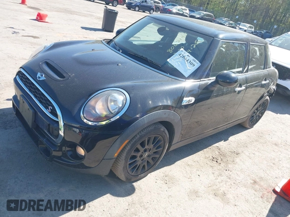 2016 MINI Hardtop 4 Door S z VIN WMWXU3C51G2D29400, wystawiony jako IAAI lot #42064309 z przebiegiem 85 021 mil mil oraz . Historia ofert i sprzedaży dostępna na DreamBid. Obrazek 2.