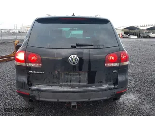 2009 Volkswagen Touareg 2 VR6 with VIN WVGBE77L29D010730, listed as a IAAI auction lot 41109415 with 230,325 mi miles. Bid and sale history available at carsss.com. Image 16.