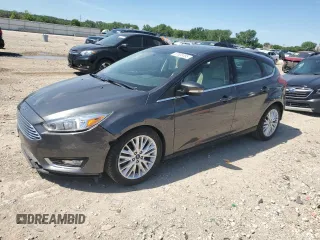 2017 Ford Focus Titanium с VIN 1FADP3N2XHL287713, выставлен на аукционе Copart как лот 57823155 с пробегом 51 828 миль миль и Списание • Salvage title. История ставок и продаж доступна на DreamBid. Изображение 1.