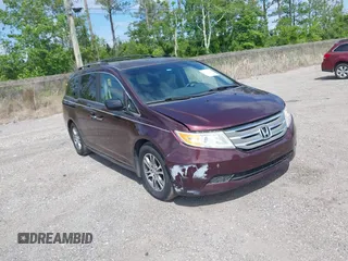 2012 Honda Odyssey EX with VIN 5FNRL5H45CB054113, listed as a IAAI auction lot 41760280 with 125,640 mi miles and . Bid and sale history available at carsss.com. Image 1.