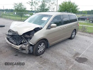 2006 Honda Odyssey EX z VIN 5FNRL38486B405492, wystawiony jako IAAI lot #42351864 z przebiegiem 297 305 mil mil oraz . Historia ofert i sprzedaży dostępna na DreamBid. Obrazek 18.