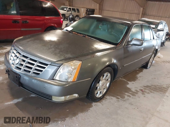2008 Cadillac DTS 1SA z VIN 1G6KD57Y58U157195, wystawiony jako IAAI lot #41534453 z przebiegiem 199 793 mil mil oraz . Historia ofert i sprzedaży dostępna na DreamBid. Obrazek 2.