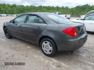 2006 Pontiac G6 1SV z VIN 1G2ZF55B064173939, wystawiony jako IAAI lot #42371852 z przebiegiem 184 690 mil mil oraz . Historia ofert i sprzedaży dostępna na DreamBid. Obrazek 3.