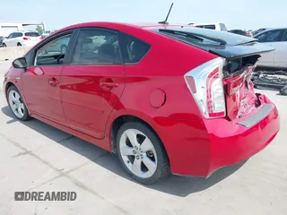 2012 Toyota Prius One with VIN JTDKN3DU8C5499775, listed as a IAAI auction lot 42065022 with 104,499 mi miles and . Bid and sale history available at carsss.com. Image 3.