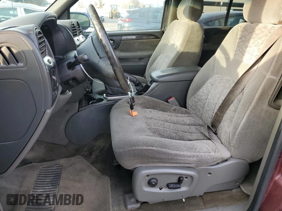 2003 GMC Envoy SLE with VIN 1GKDS13S732335607, listed as a Copart auction lot 85300374 with 305,651 mi miles and Salvage Title. Bid and sale history available at carsss.com. Image 7.