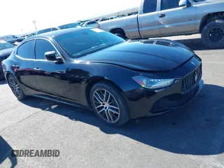 2015 Maserati Ghibli z VIN ZAM57XSAXF1146095, wystawiony jako IAAI lot #41637782 z przebiegiem 102 152 mil mil oraz . Historia ofert i sprzedaży dostępna na DreamBid. Obrazek 1.