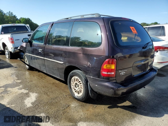 1998 Ford Windstar GL with VIN 2FMDA5145WBB91480, listed as a Copart auction lot 52155155 with 101,104 mi miles and Salvage title. Bid and sale history available at DreamBid. Image 2.