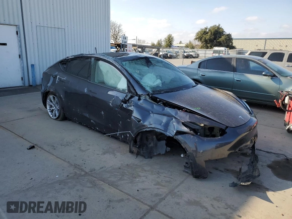 2024 Tesla Model Y Long Range with VIN 7SAYGDEE6RF063230, listed as a Copart auction lot 42872535 with Not Provided miles and Salvage Title. Bid and sale history available at DreamBid. Image 4.