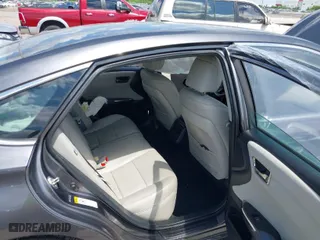 2014 Toyota Avalon Limited with VIN 4T1BK1EB3EU100754, listed as a IAAI auction lot 39446319 with 82,624 mi miles. Bid and sale history available at carsss.com. Image 8.