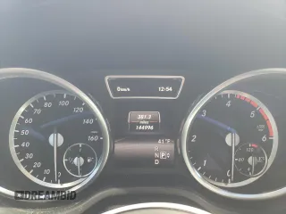 2016 Mercedes-Benz GL with VIN 4JGDF2EE2GA640355, listed as a Copart auction lot 87464054 with 144,996 mi miles and Salvage Title. Bid and sale history available at carsss.com. Image 9.