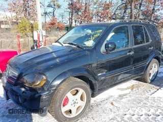 2001 Mercedes-Benz M-Class AMG with VIN 4JGAB74E71A255572, listed as a IAAI auction lot 41415938 with 78,185 mi miles. Bid and sale history available at carsss.com. Image 2.